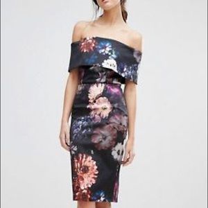 Never been worn! Scuba material off should dress